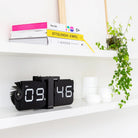Cloudnola · Black Flipping Out Clock | socius design in Rochester, MN